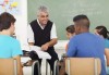 senior high school teacher teaching in classroom