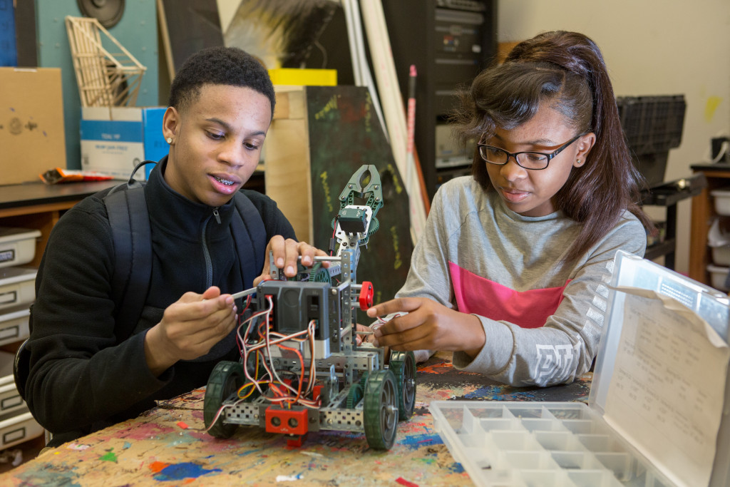 Ninth-grade students assemble a robot in an engineering class at MC2 STEM High School. Photo by Allison Shelley/The Verbatim Agency for American Education: Images of Teachers and Students in Action
