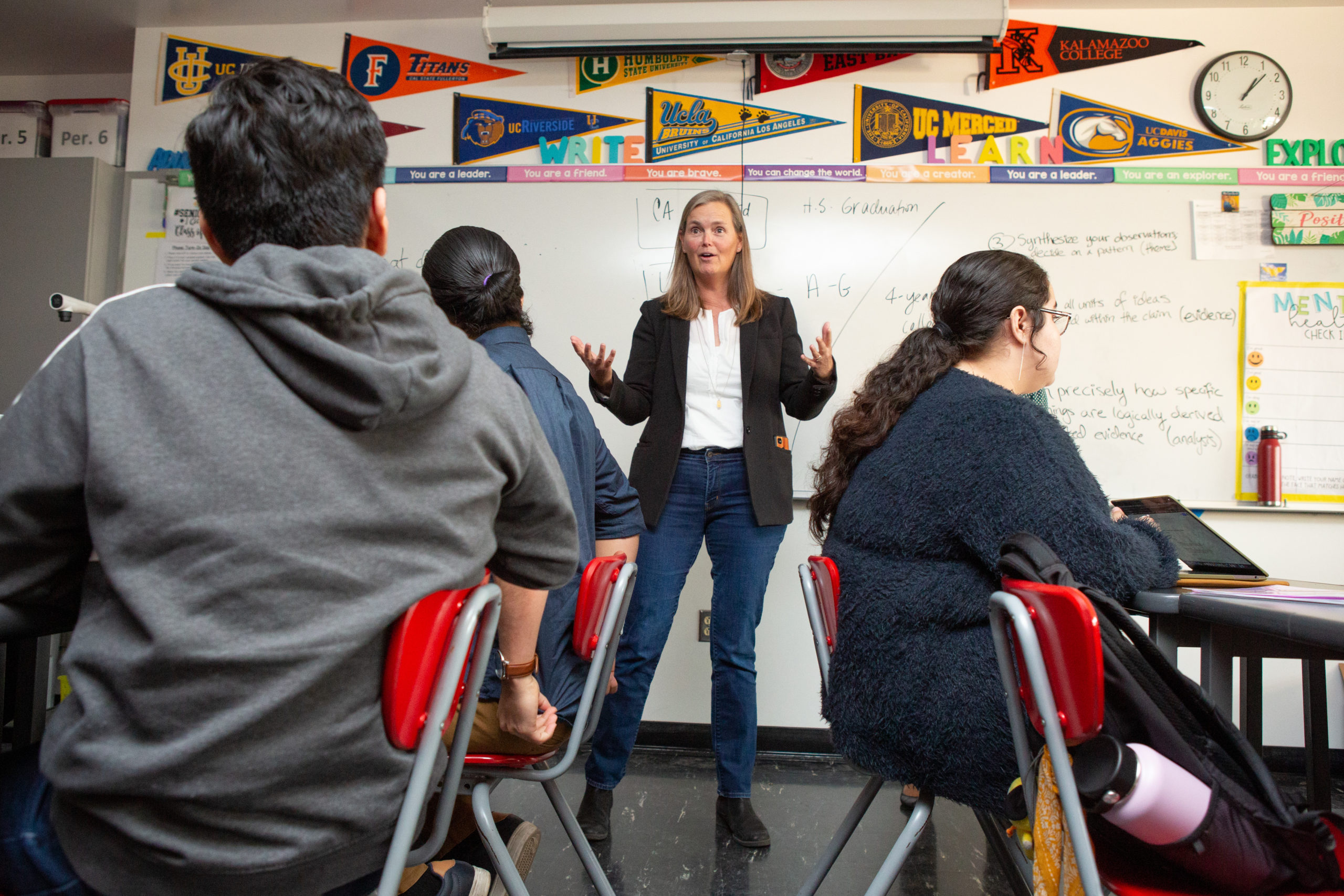 Teacher leads high school research class A teacher kicks off a lesson during an AP research class.
